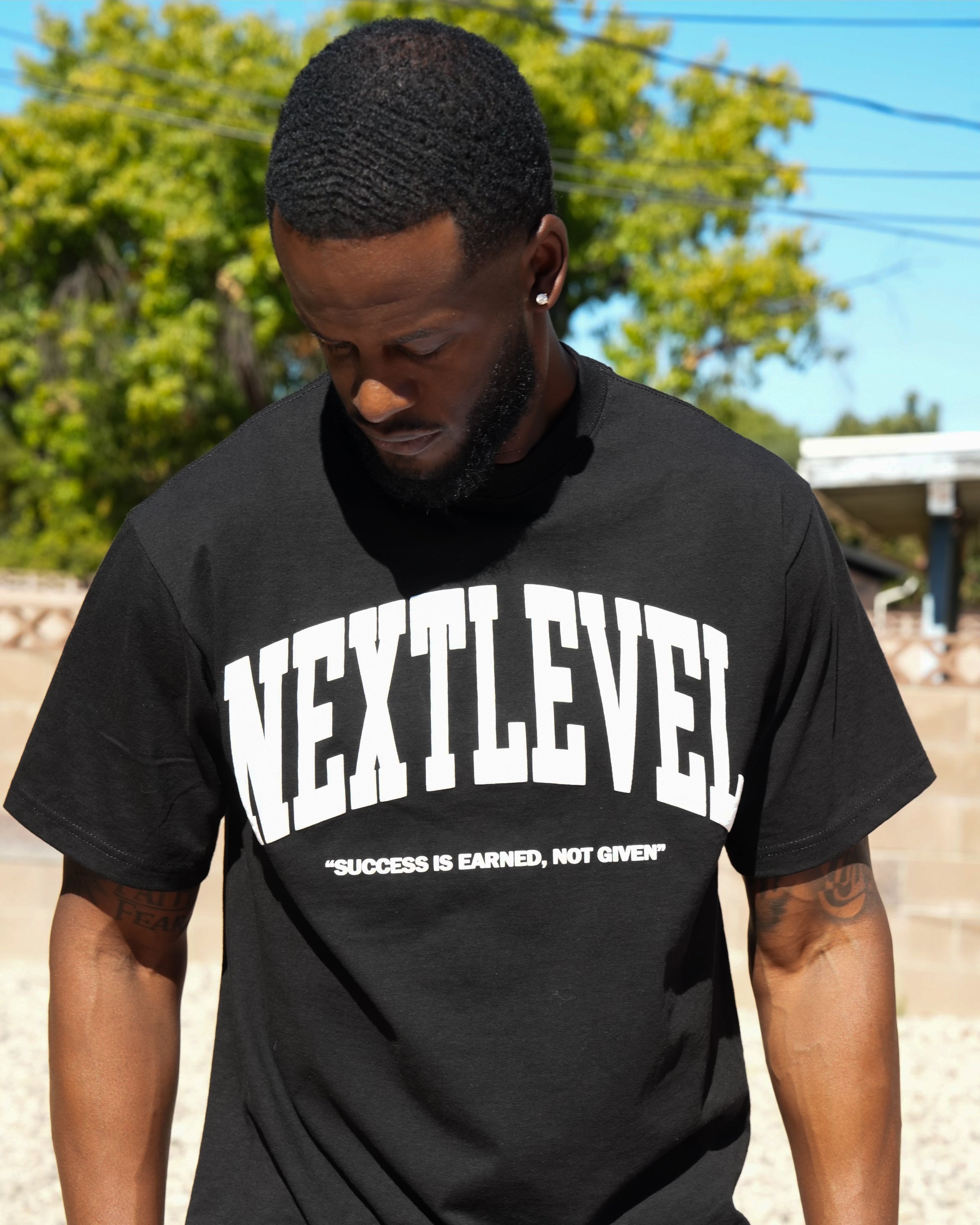 “BIG ARCH” NEXT LEVEL TEE (PUFF PRINT)